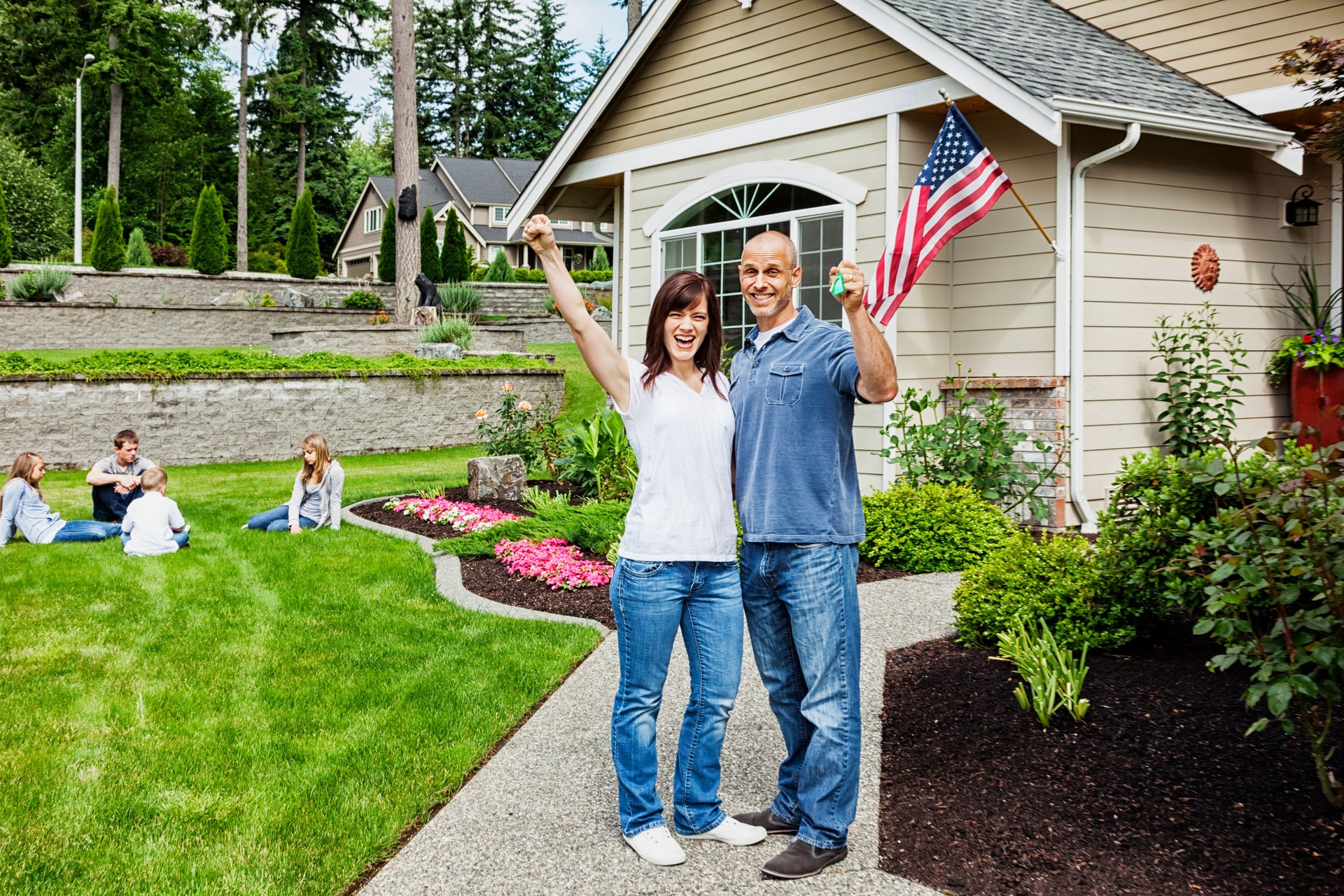 Happy Family with New Home